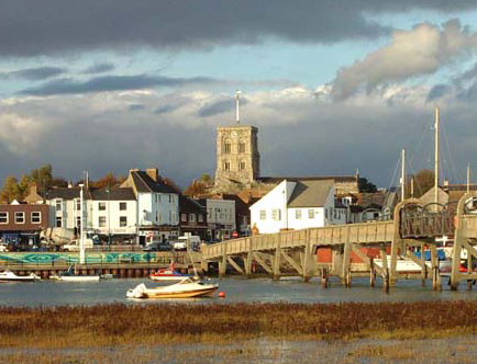 Shoreham Town Centre from the south side of the River Adur, featuring the  Church of St. Mary de Haura