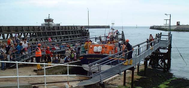 Lifeboat and the Entrance to the Port of Shoreham (Photograph by Ray Hamblett)